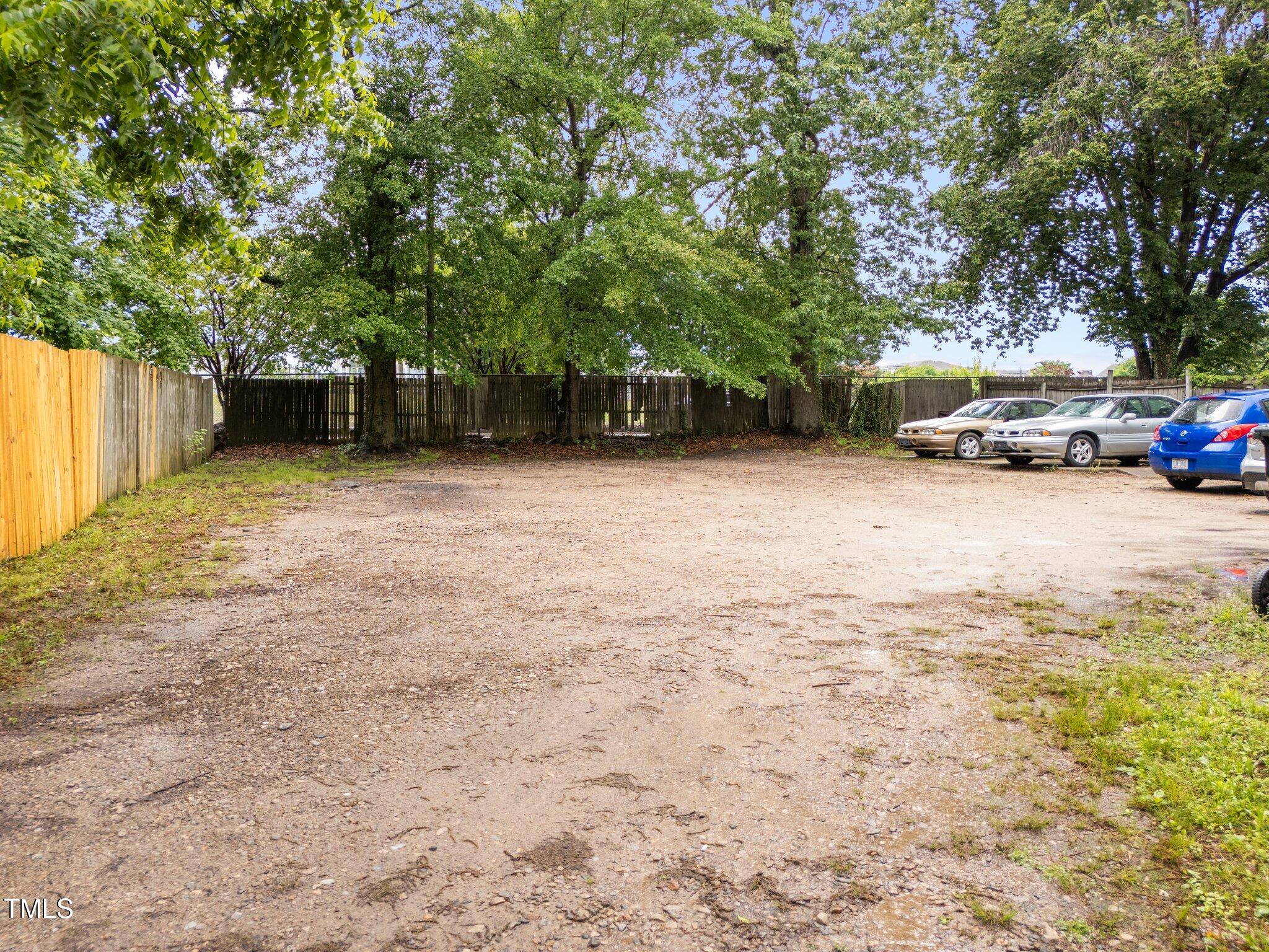 313 Colleton Road Raleigh, NC 27610 - Photo 22 of 32 a view of a parking area
