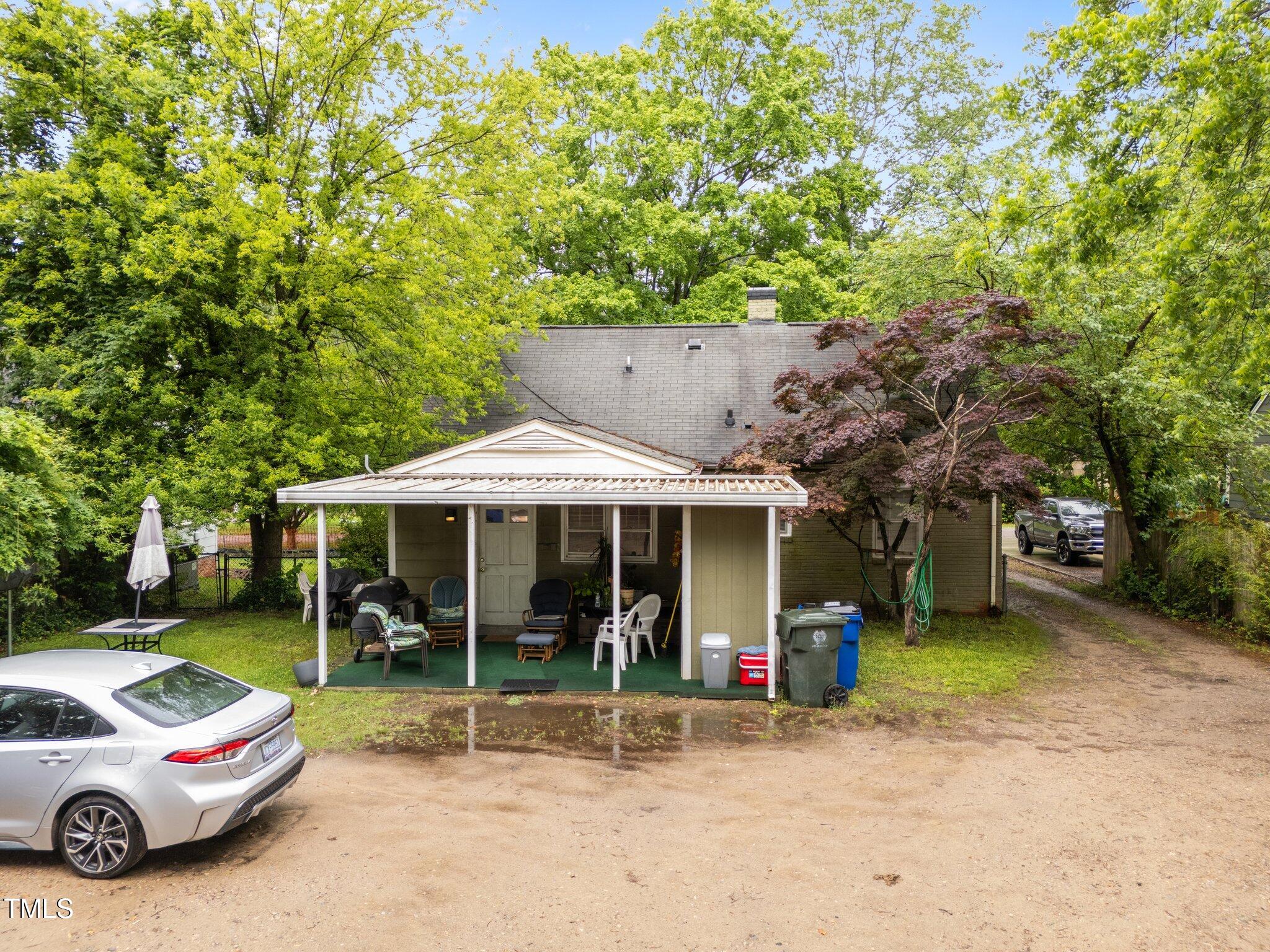 313 Colleton Road Raleigh, NC 27610 - Photo 23 of 32 a view of a car park in front of house
