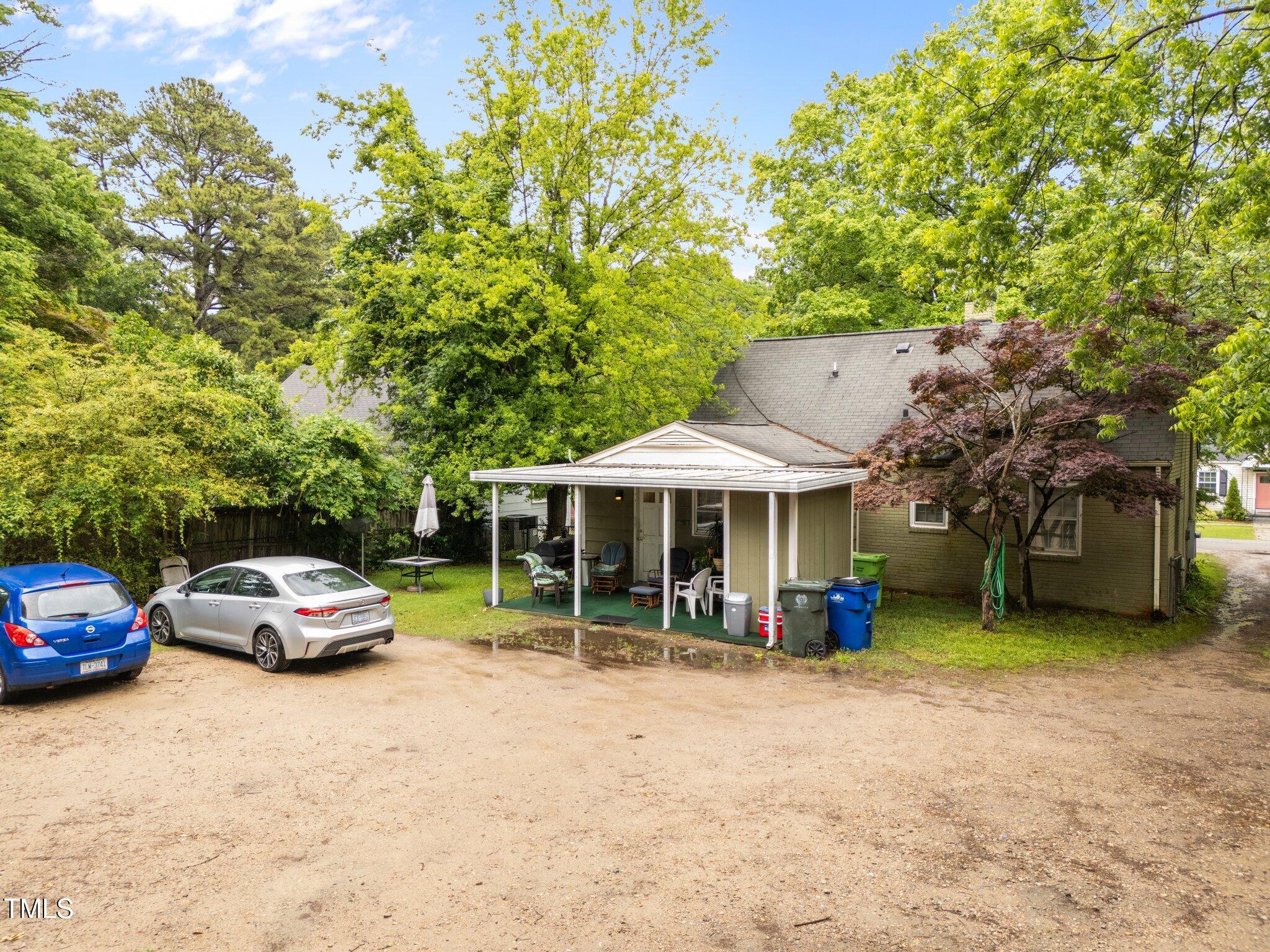 313 Colleton Road Raleigh, NC 27610 - Photo 24 of 32 a car parked in front of a house