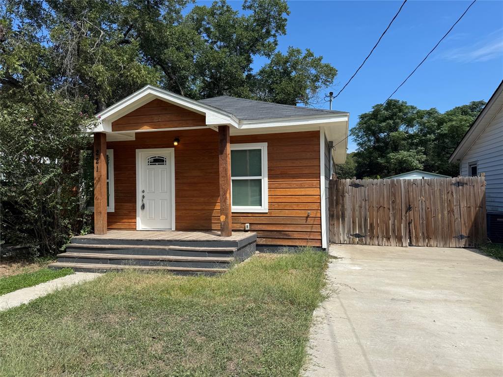 211 North Bermuda Street Lacy-Lakeview, TX 76705 - Photo 2 of 23 a front view of a house with a yard