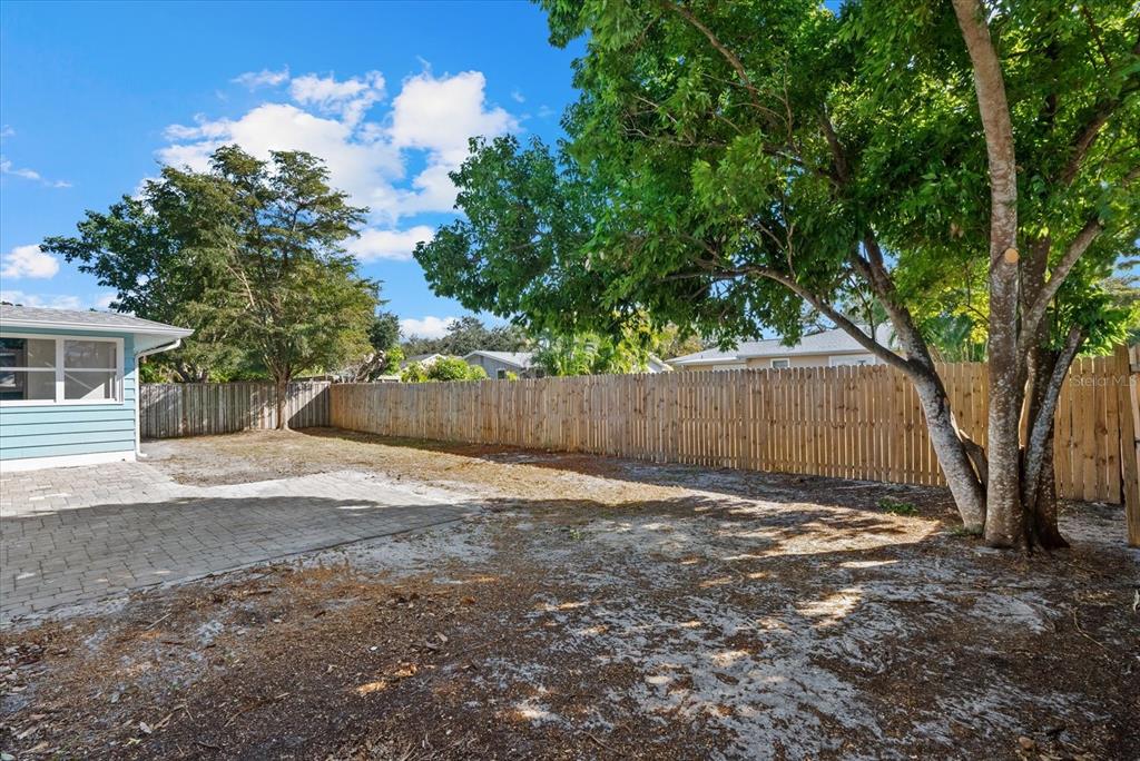 2104 Datura Street Sarasota, FL 34239 - Photo 34 of 48 a view of backyard with tree
