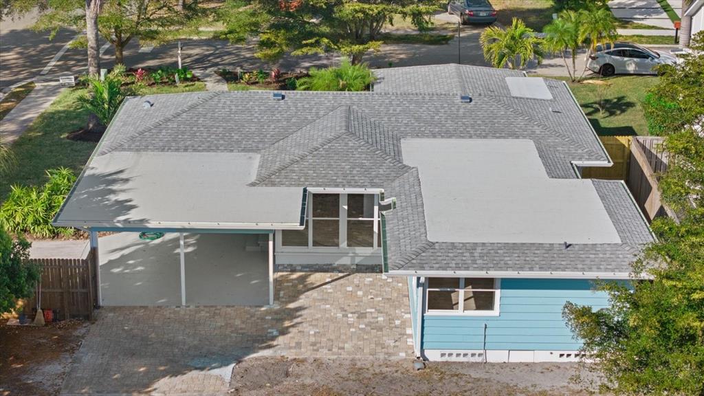 2104 Datura Street Sarasota, FL 34239 - Photo 39 of 48 an aerial view of a house with a yard and garage