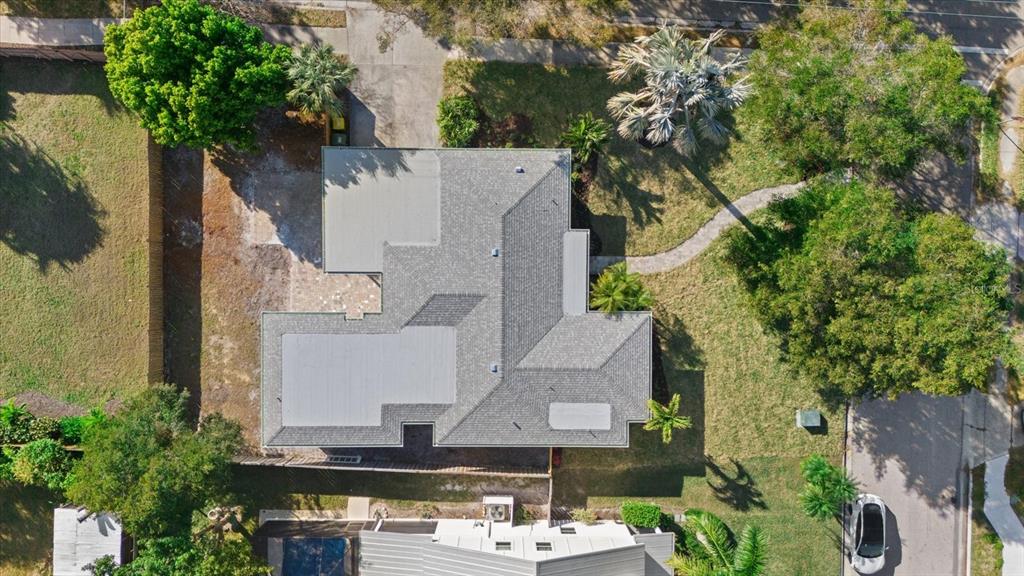 2104 Datura Street Sarasota, FL 34239 - Photo 40 of 48 an aerial view of a house with a yard and fountain in middle