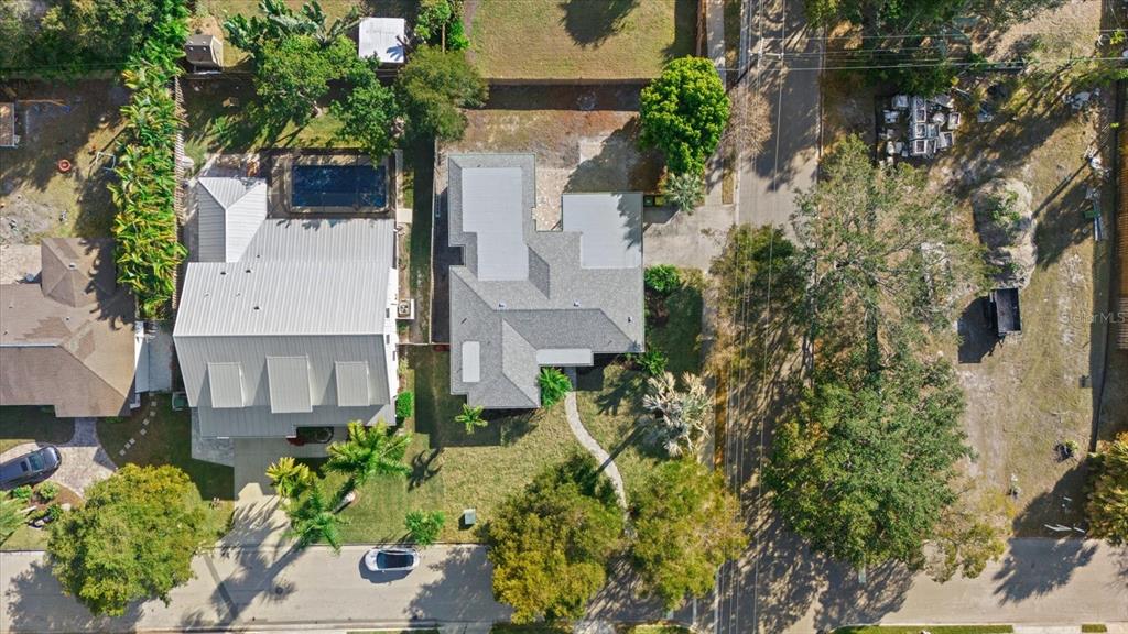 2104 Datura Street Sarasota, FL 34239 - Photo 41 of 48 an aerial view of a house with a yard and garden
