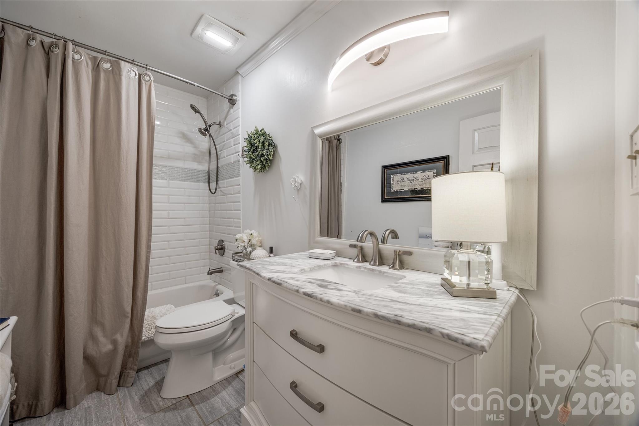 2915 Timber Ridge Lane Rock Hill, SC 29732 - Photo 13 of 41 a bathroom with a granite countertop sink toilet and shower