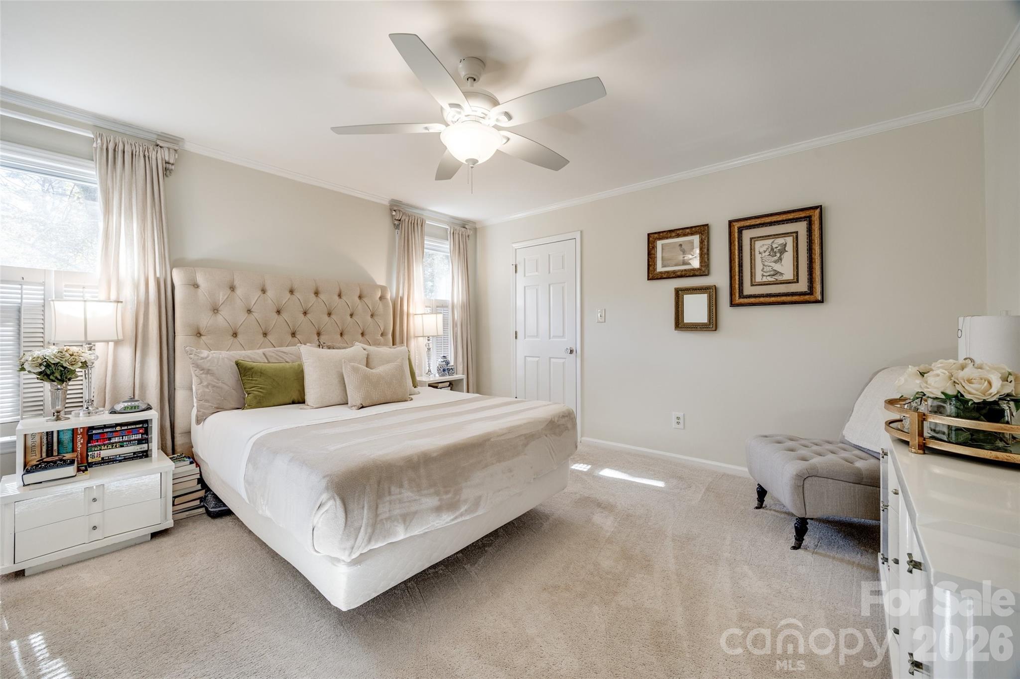 2915 Timber Ridge Lane Rock Hill, SC 29732 - Photo 14 of 41 a bedroom with a bed and a chandelier