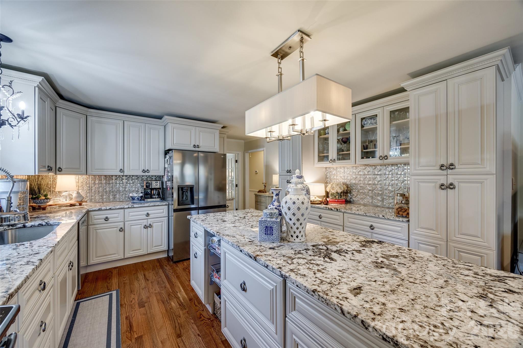 2915 Timber Ridge Lane Rock Hill, SC 29732 - Photo 18 of 41 a kitchen with stainless steel appliances granite countertop a sink stove and refrigerator