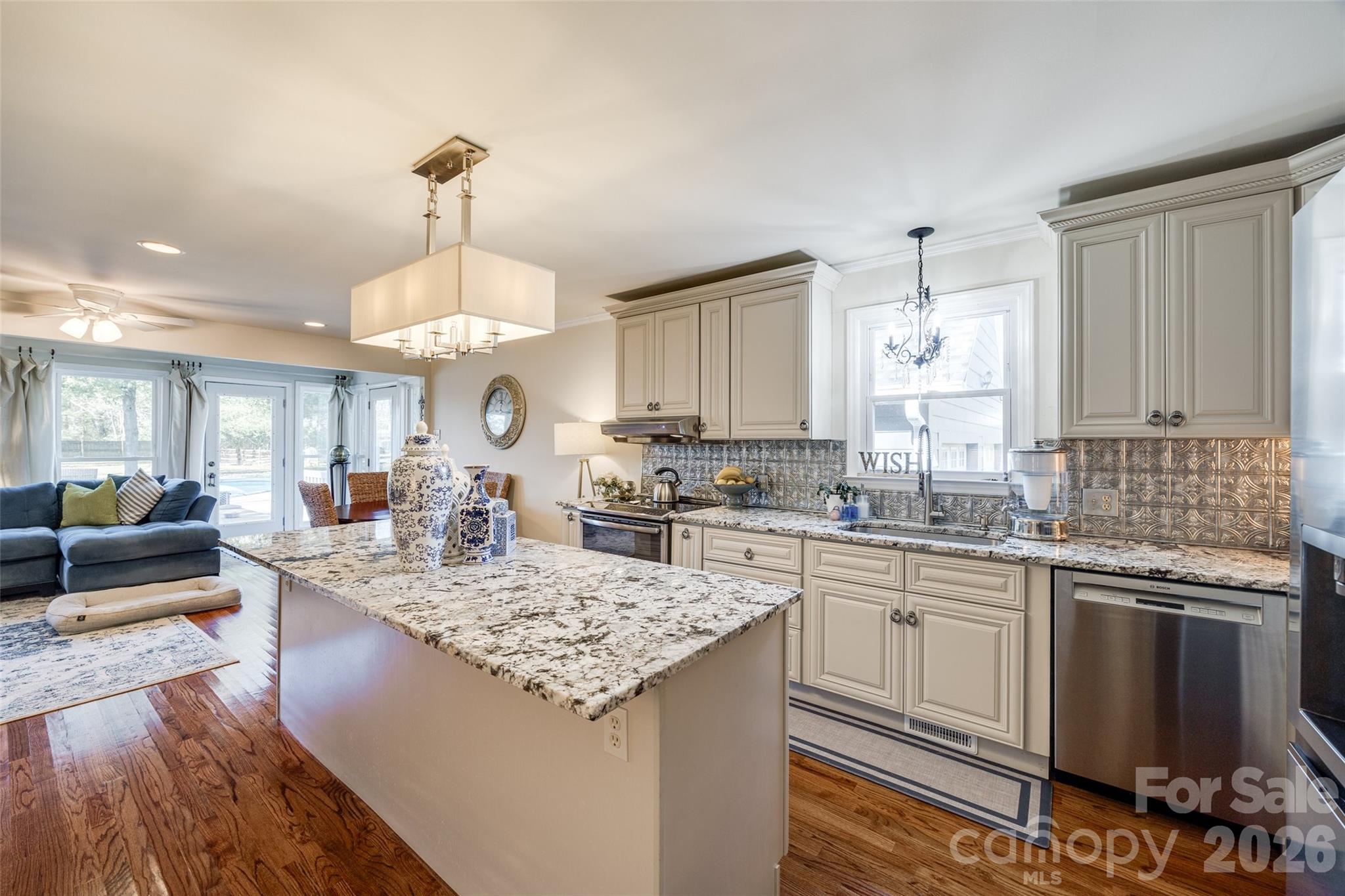 2915 Timber Ridge Lane Rock Hill, SC 29732 - Photo 20 of 41 a large kitchen with granite countertop a sink a stove and cabinets