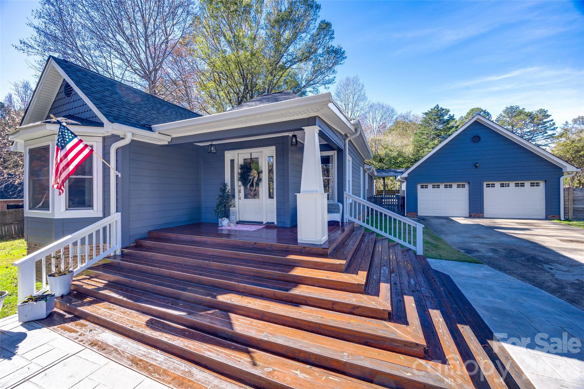 2915 Timber Ridge Lane Rock Hill, SC 29732 - Photo 2 of 41 a view of house with wooden stairs and a large tree