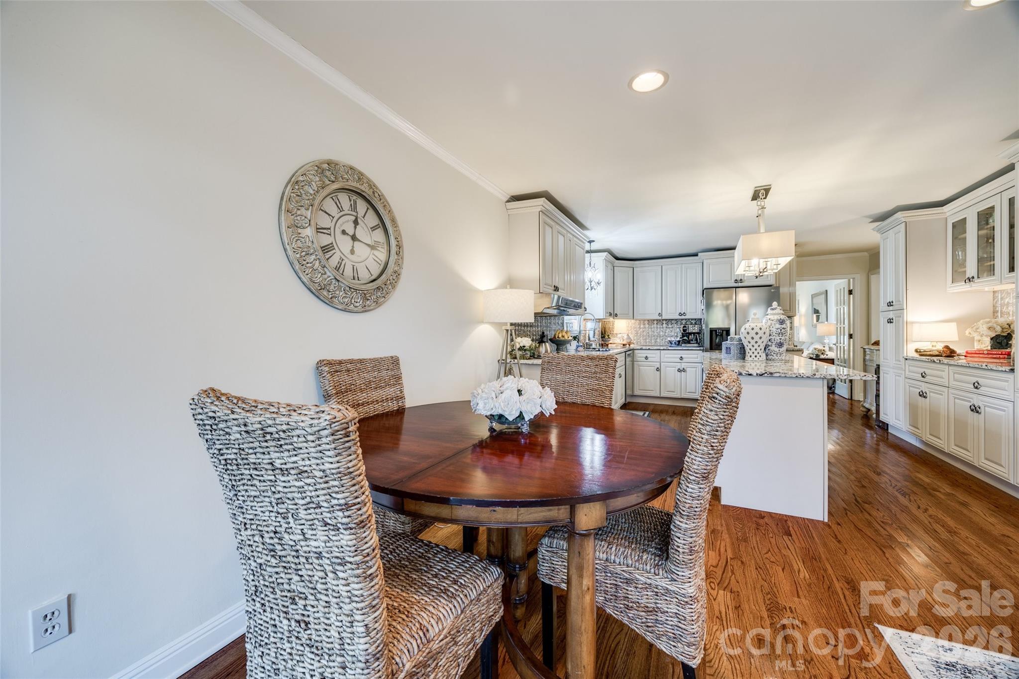 2915 Timber Ridge Lane Rock Hill, SC 29732 - Photo 22 of 41 a view of a dining room with furniture and wooden floor