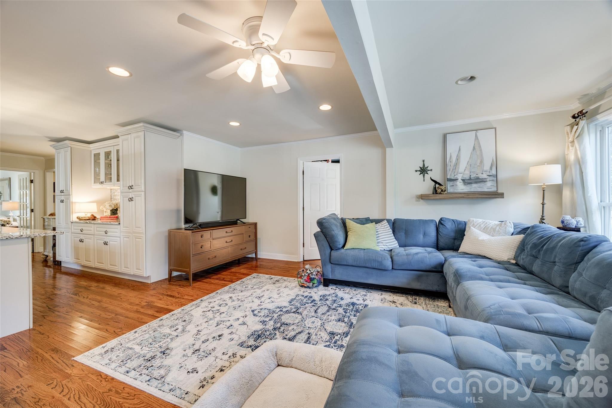 2915 Timber Ridge Lane Rock Hill, SC 29732 - Photo 23 of 41 a living room with furniture and a wooden floor