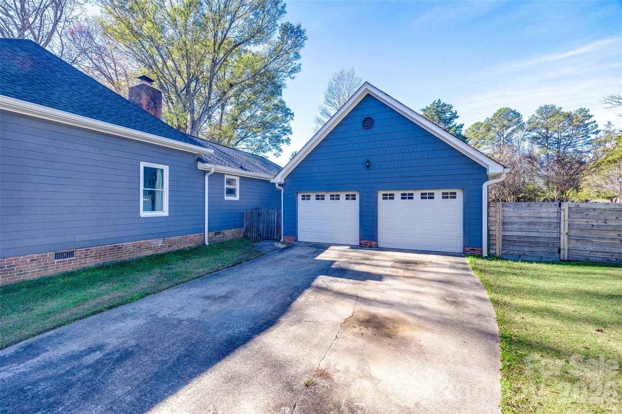 2915 Timber Ridge Lane Rock Hill, SC 29732 - Photo 41 of 41 a view of a house with a yard and garage