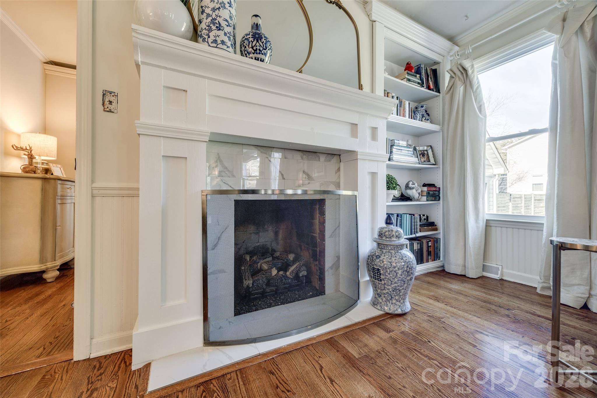 2915 Timber Ridge Lane Rock Hill, SC 29732 - Photo 8 of 41 a view of a livingroom with wooden floor and a fireplace