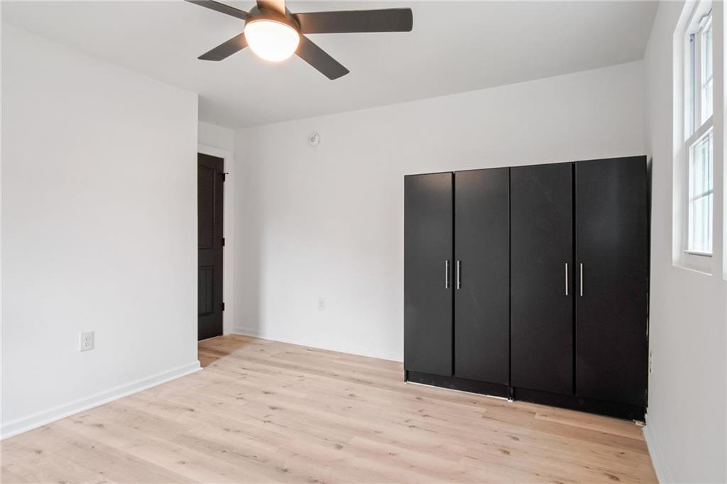 2327 El Paso Road Southwest Atlanta, GA 30331 - Photo 11 of 35 a view of an empty room with wooden floor