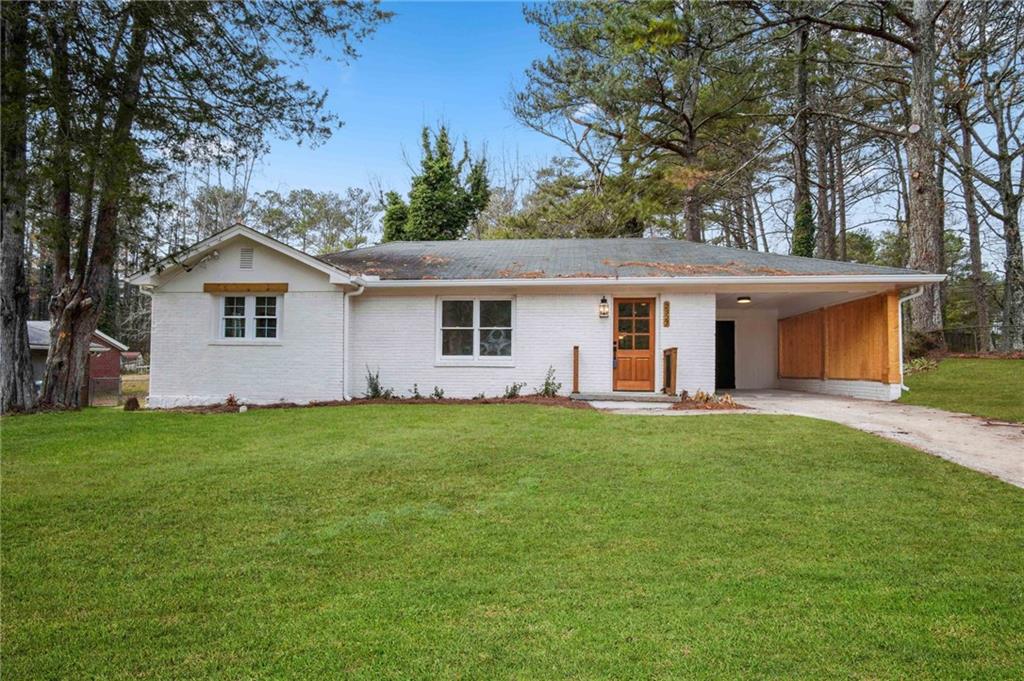 2327 El Paso Road Southwest Atlanta, GA 30331 - Photo 2 of 35 a view of a backyard with a garden