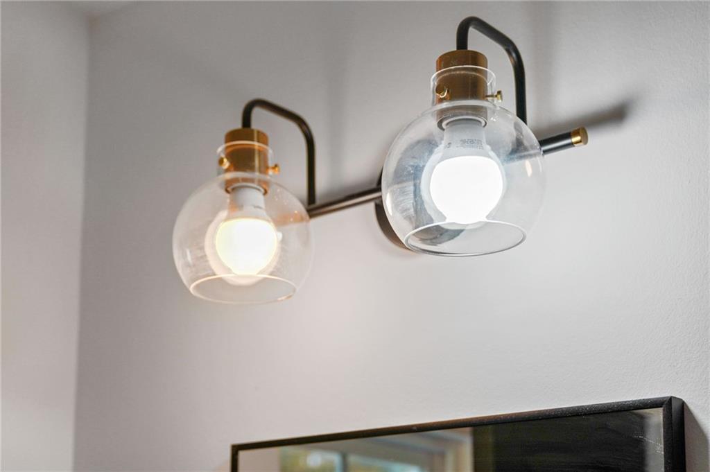 2327 El Paso Road Southwest Atlanta, GA 30331 - Photo 28 of 35 a close view of light fixtures and a mirror on a table