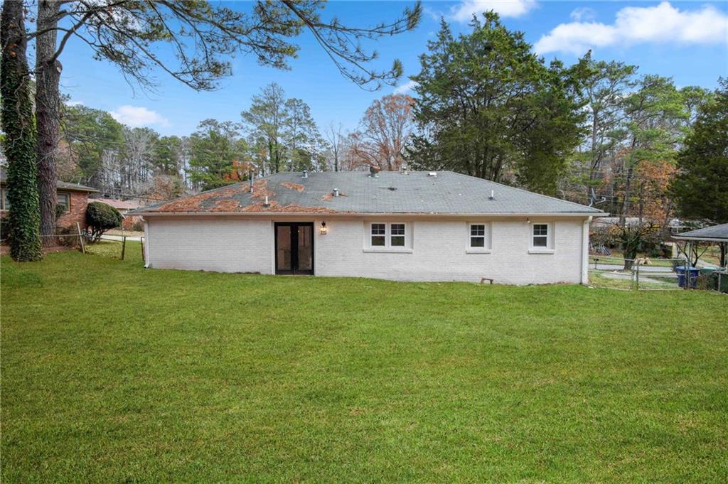 2327 El Paso Road Southwest Atlanta, GA 30331 - Photo 33 of 35 a view of a house with a backyard