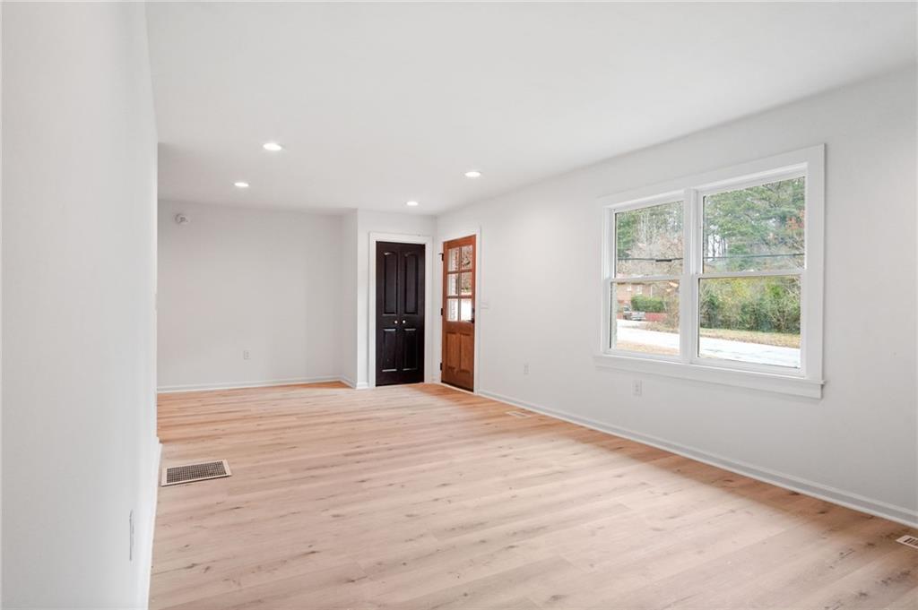 2327 El Paso Road Southwest Atlanta, GA 30331 - Photo 6 of 35 an empty room with windows and closet