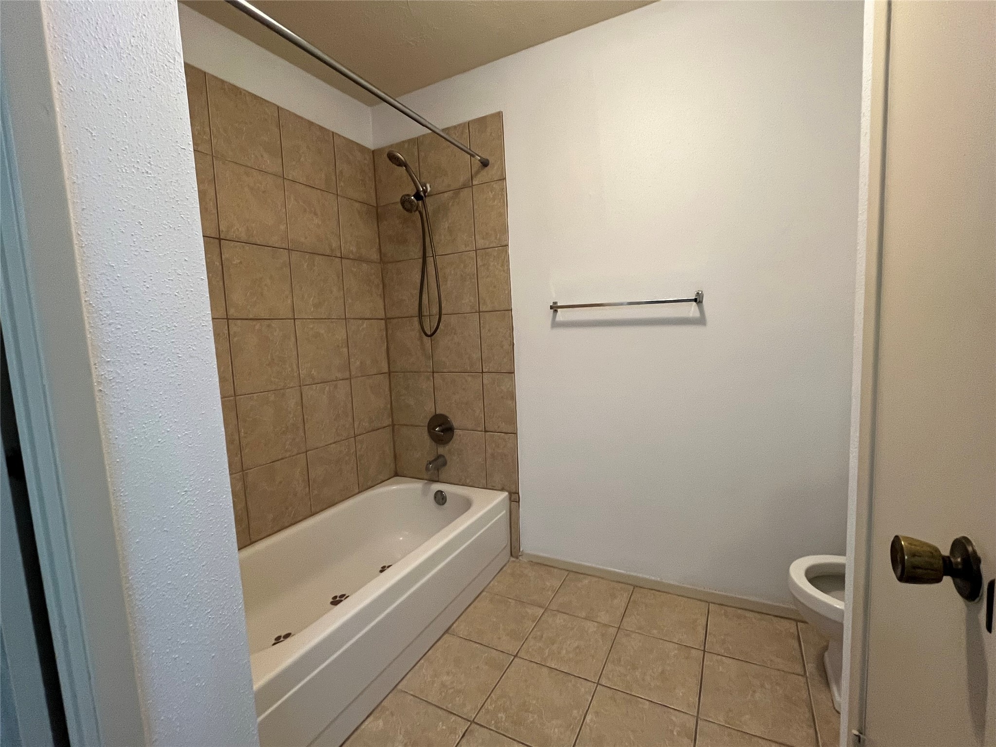 5535 Ashgate Drive Spring, TX 77373 - Photo 13 of 15 Tiled tub closure and floor in secondary bath
