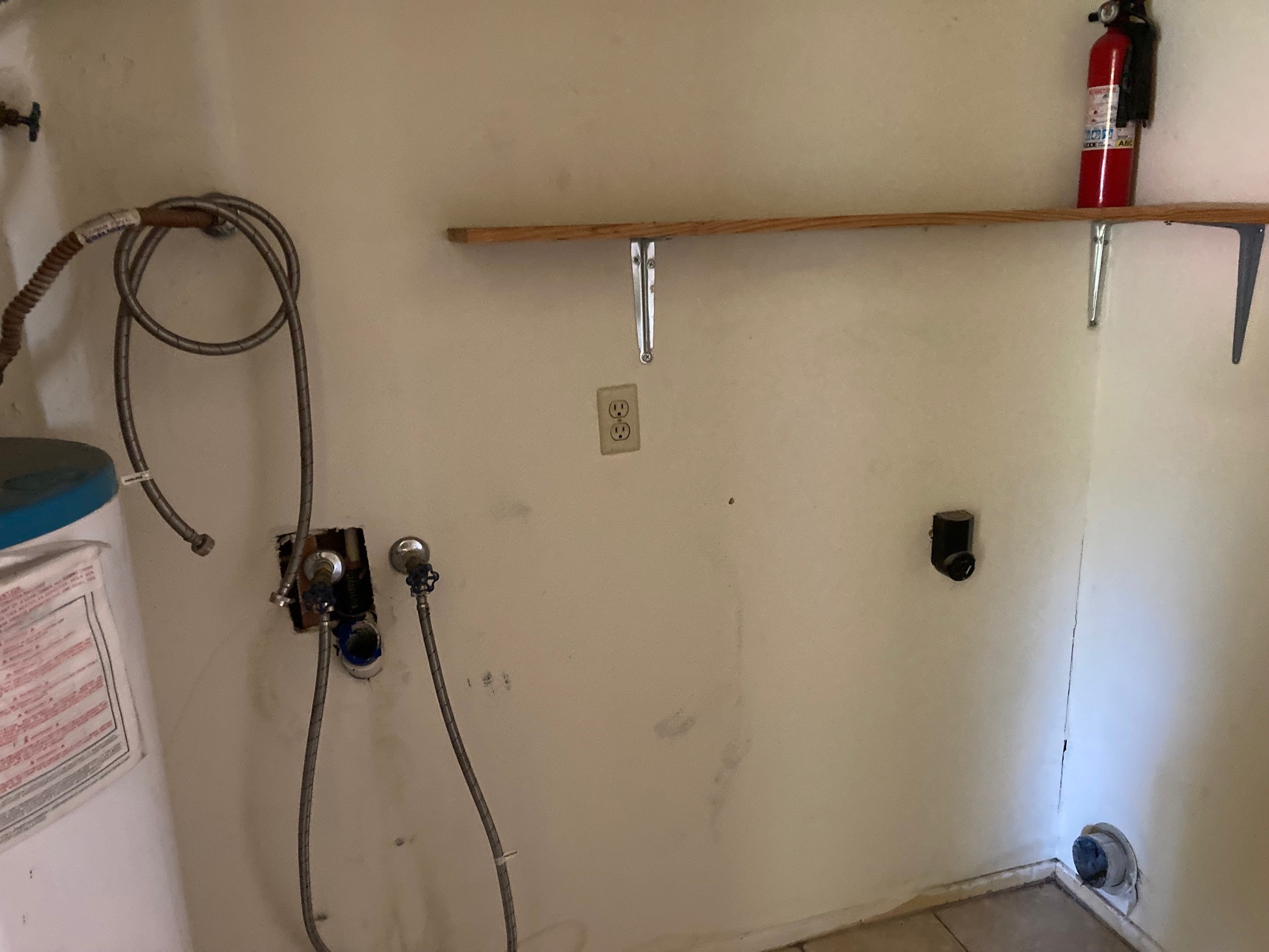 5535 Ashgate Drive Spring, TX 77373 - Photo 5 of 15 Inside utilities in a closet off hallway