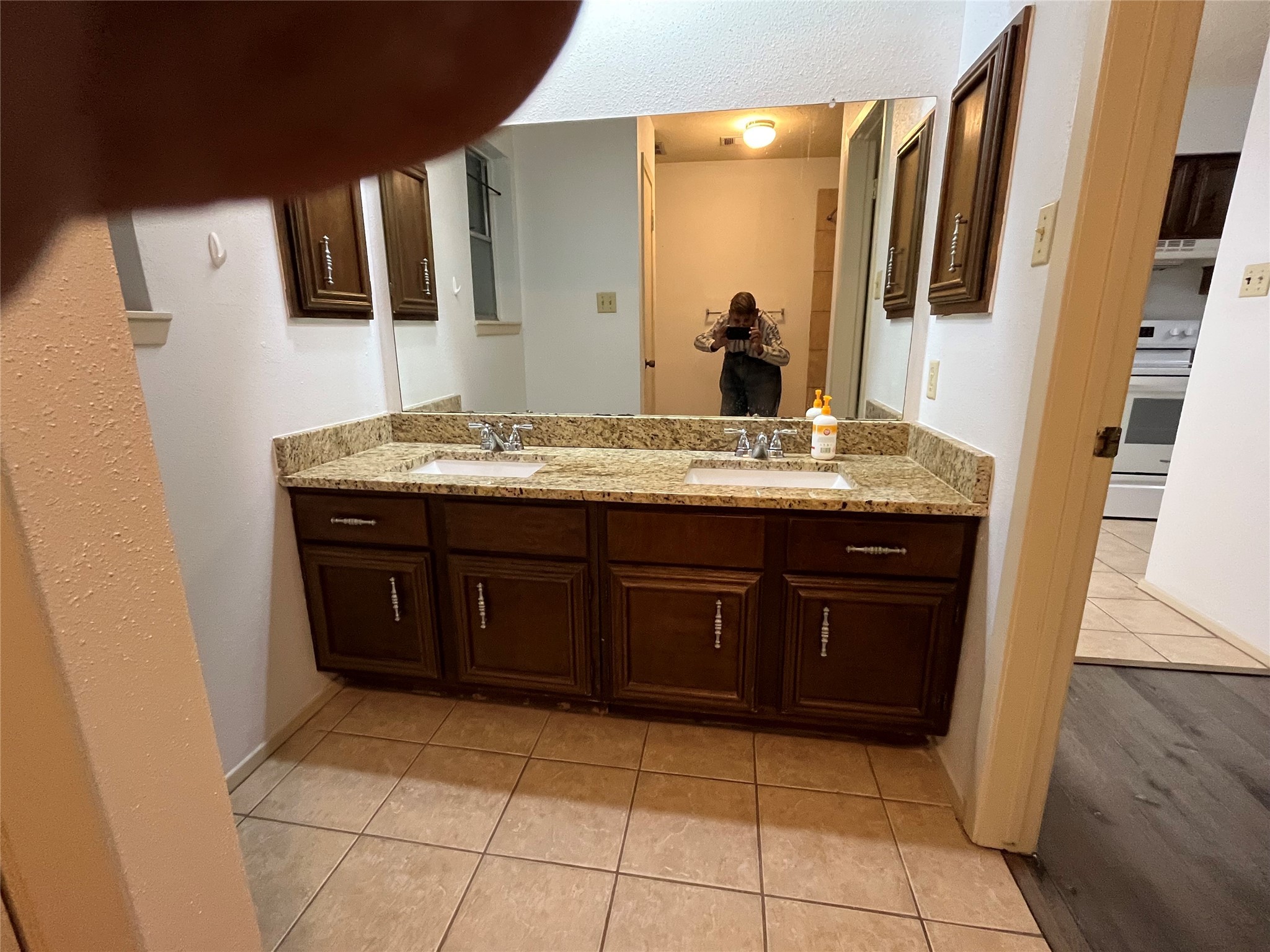 5535 Ashgate Drive Spring, TX 77373 - Photo 8 of 15 Mater bath dressing area with double vanities and granite counter tops and tiled area.