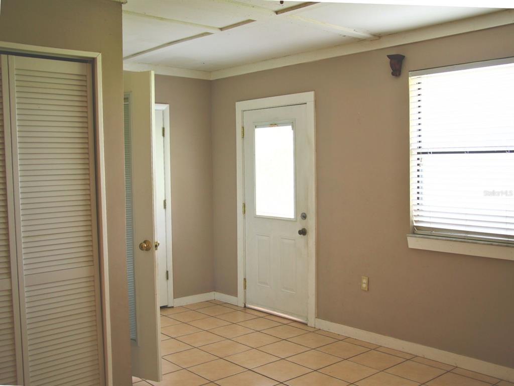 2282 Firestone Place Winter Haven, FL 33884 - Photo 16 of 34 a view of an empty room with window