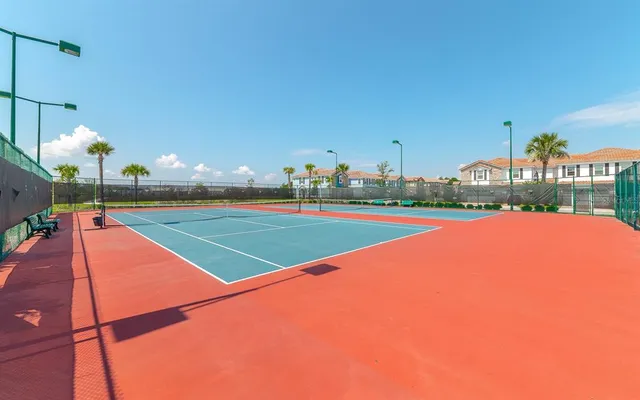 a view of a golf course with a swimming pool