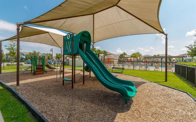 a view of outdoor space with swimming pool