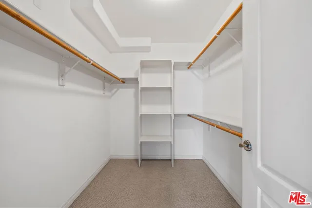 a view of an empty walk in closet