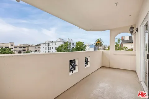 a bathroom with a granite countertop sink a bathtub a mirror and a shower
