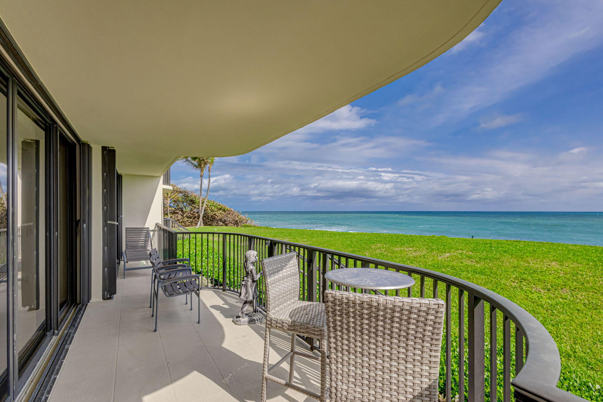 400 South Beach Road, Unit 103 Tequesta, FL 33469 - Photo 29 of 61 Living Room Terrace