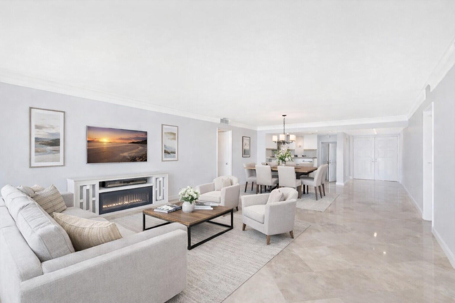 400 South Beach Road, Unit 103 Tequesta, FL 33469 - Photo 5 of 61 a living room with furniture and a flat screen tv