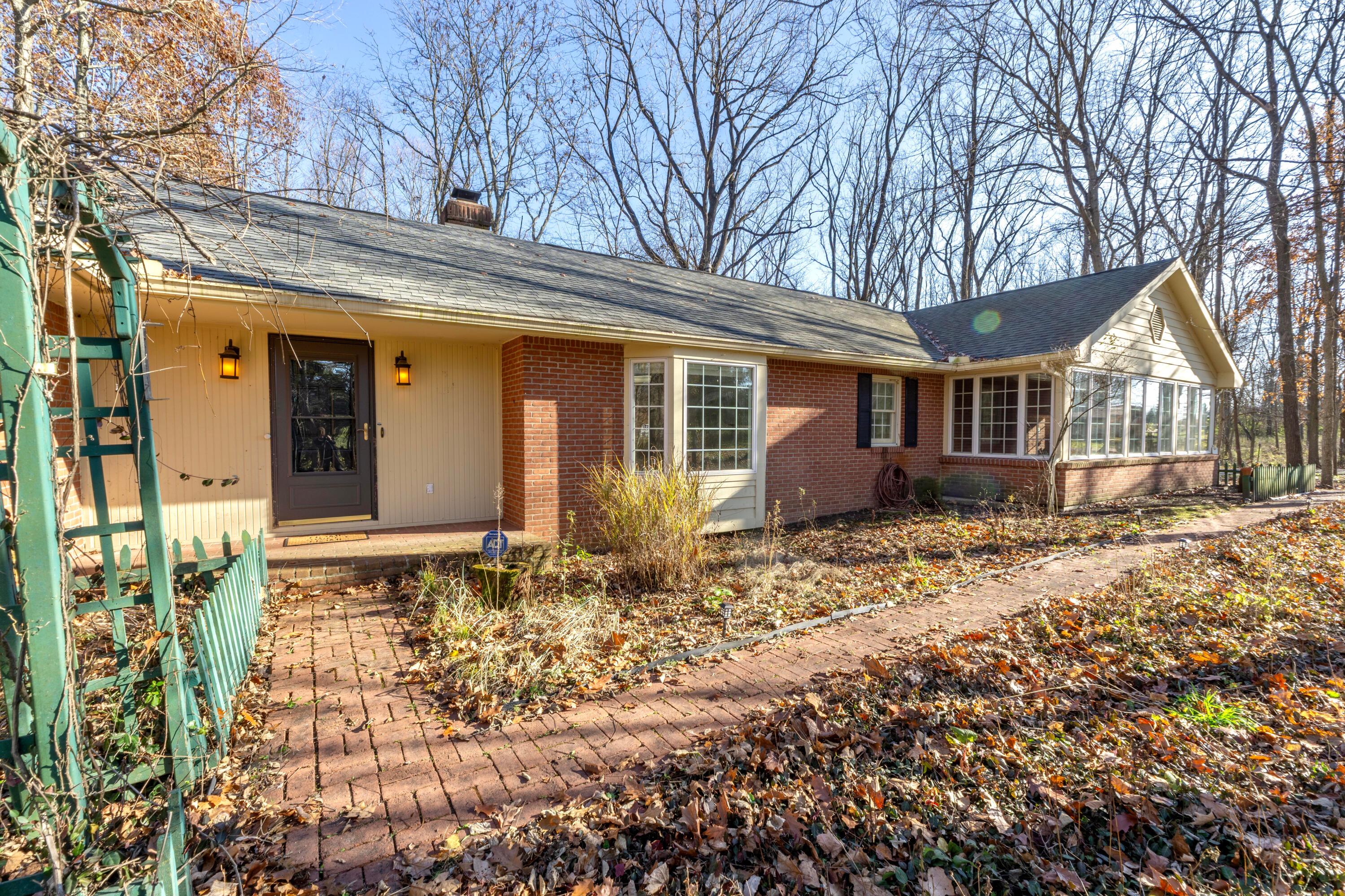 3880 Fry Road Ostrander, OH 43061 - Photo 11 of 82 Brick walk to the covered front door.