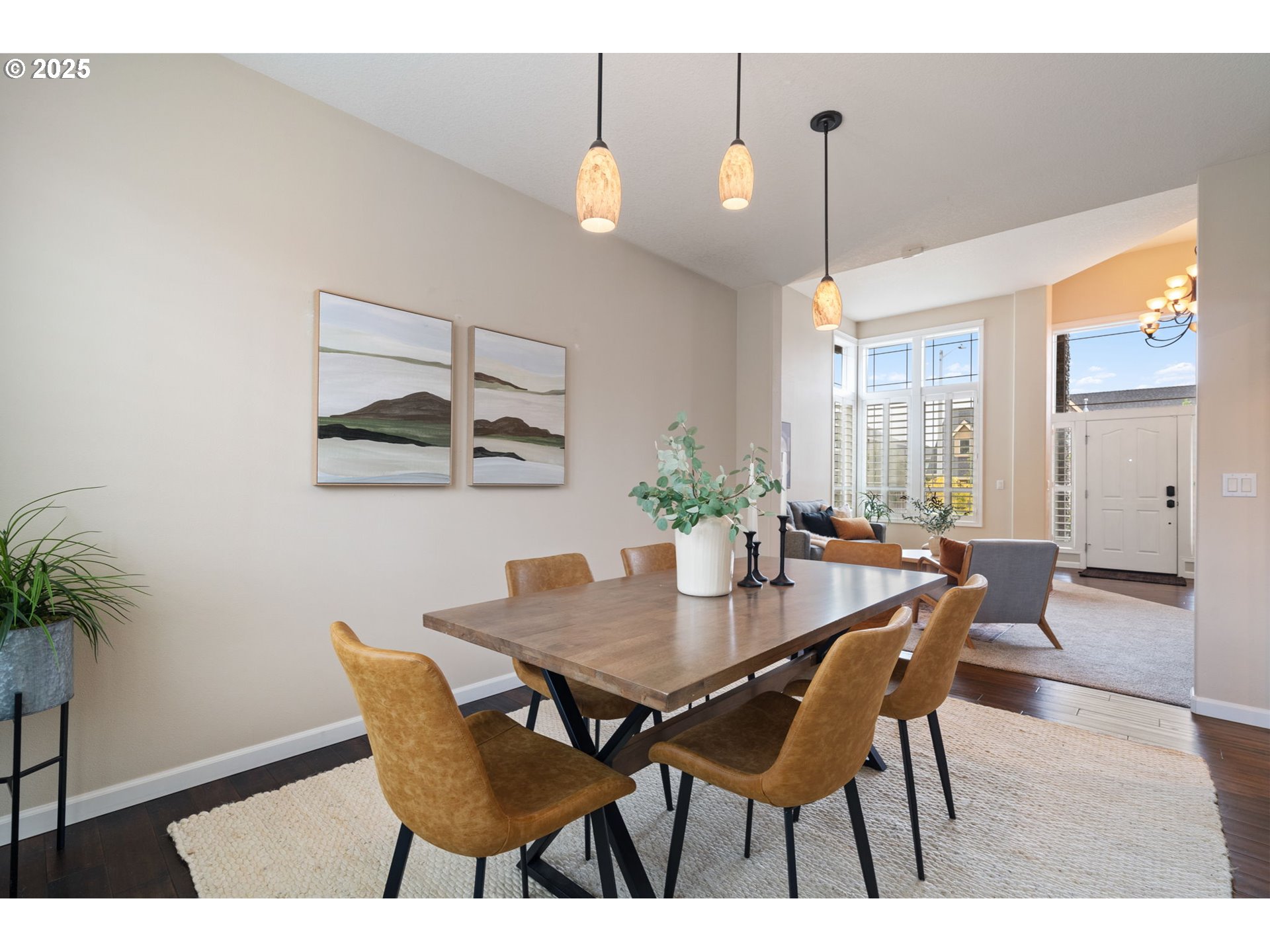 1516 South Dusky Drive Ridgefield, WA 98642 - Photo 11 of 43 a view of a dining room with furniture and wooden floor