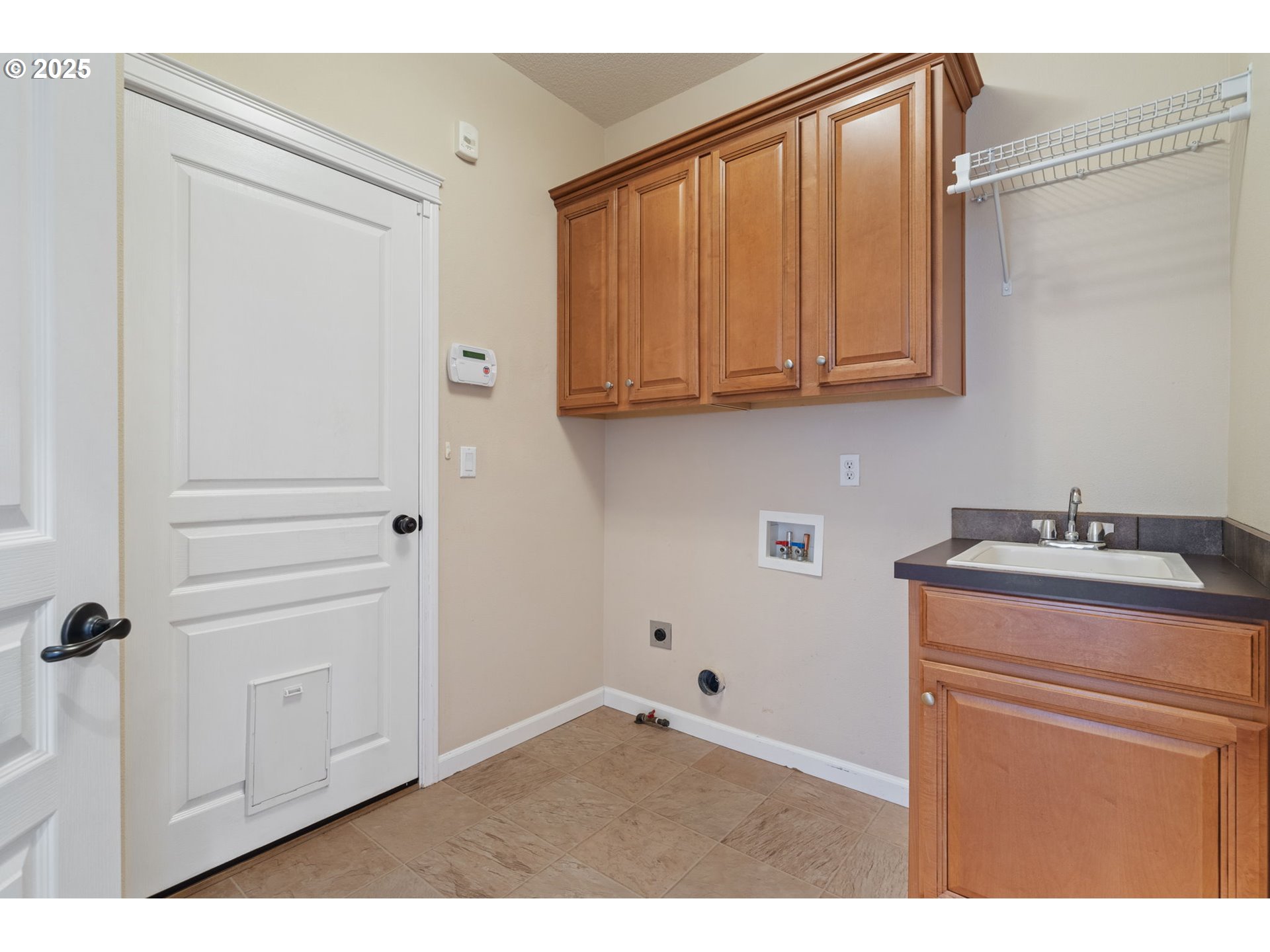 1516 South Dusky Drive Ridgefield, WA 98642 - Photo 18 of 43 a view of storage and utility room with washer and dryer