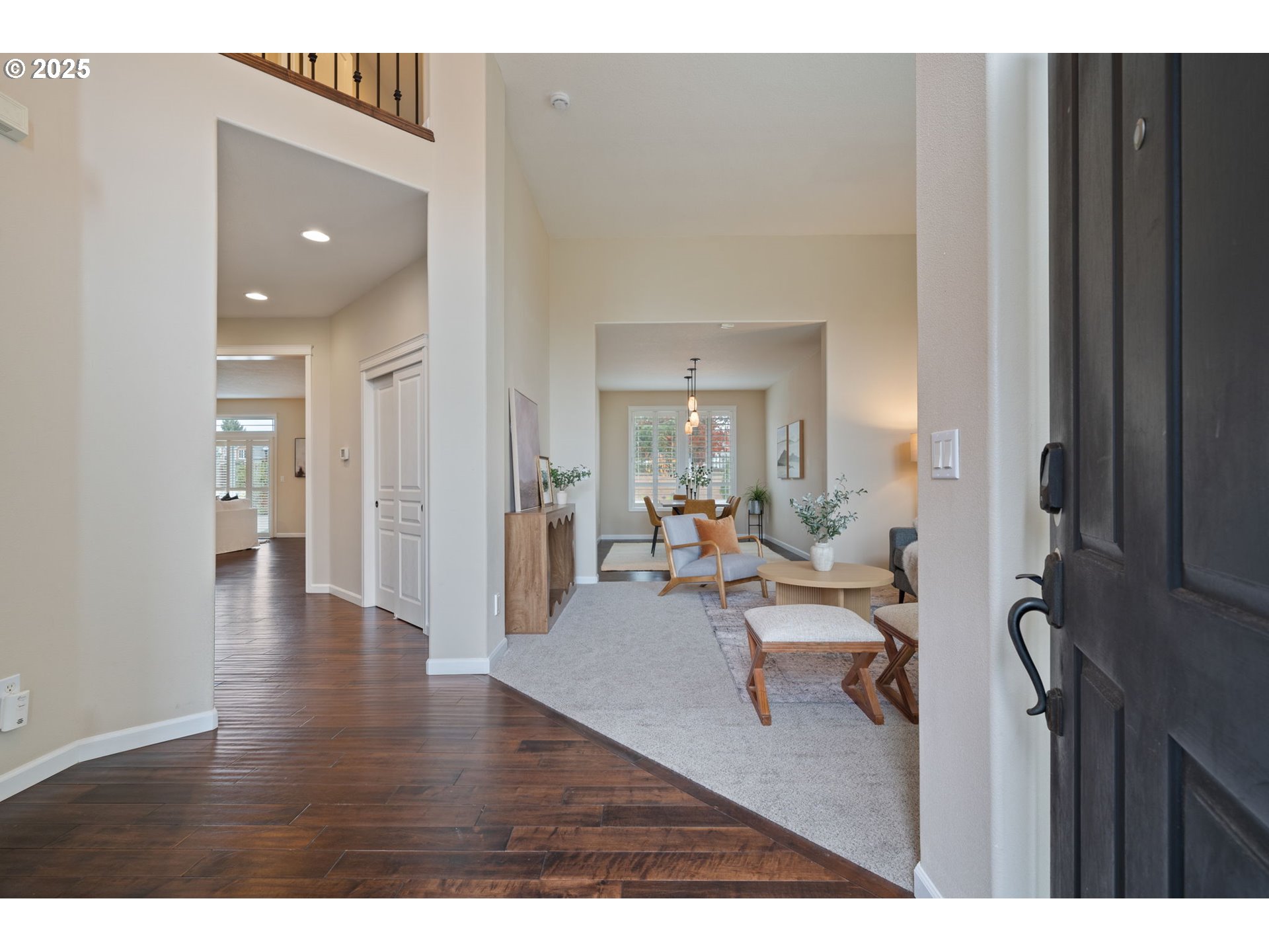 1516 South Dusky Drive Ridgefield, WA 98642 - Photo 2 of 43 a view of a livingroom with furniture and hardwood floor