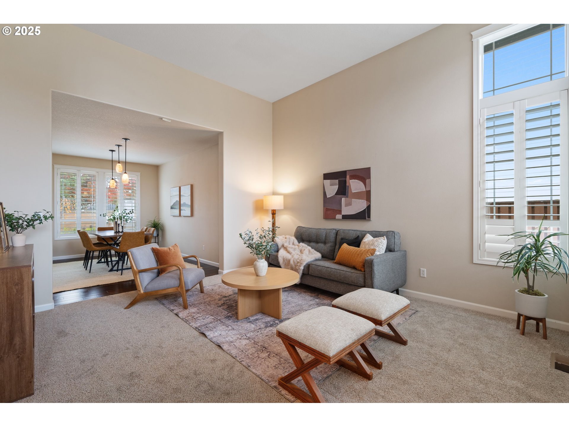 1516 South Dusky Drive Ridgefield, WA 98642 - Photo 3 of 43 a living room with furniture and a potted plant