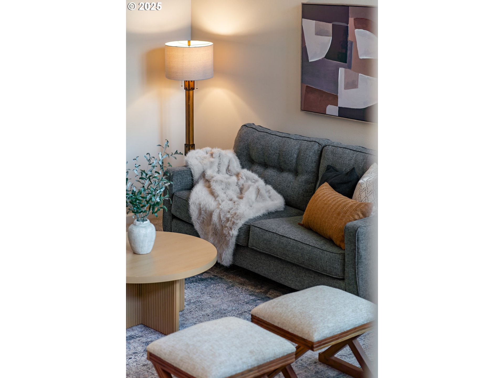 1516 South Dusky Drive Ridgefield, WA 98642 - Photo 4 of 43 a living room with furniture and a lamp
