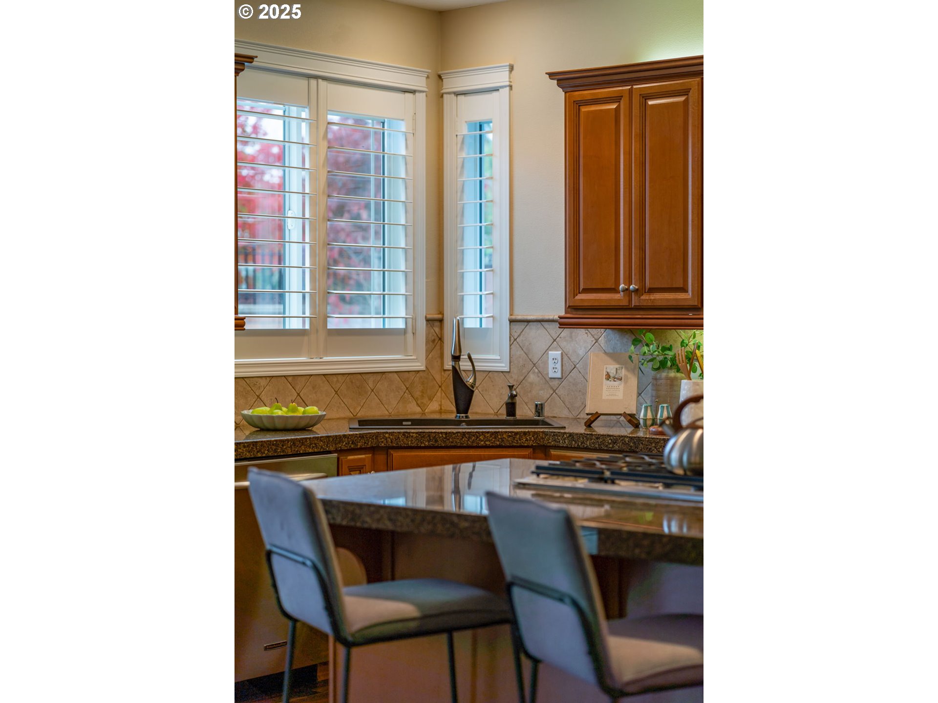 1516 South Dusky Drive Ridgefield, WA 98642 - Photo 7 of 43 a kitchen with a sink and cabinets