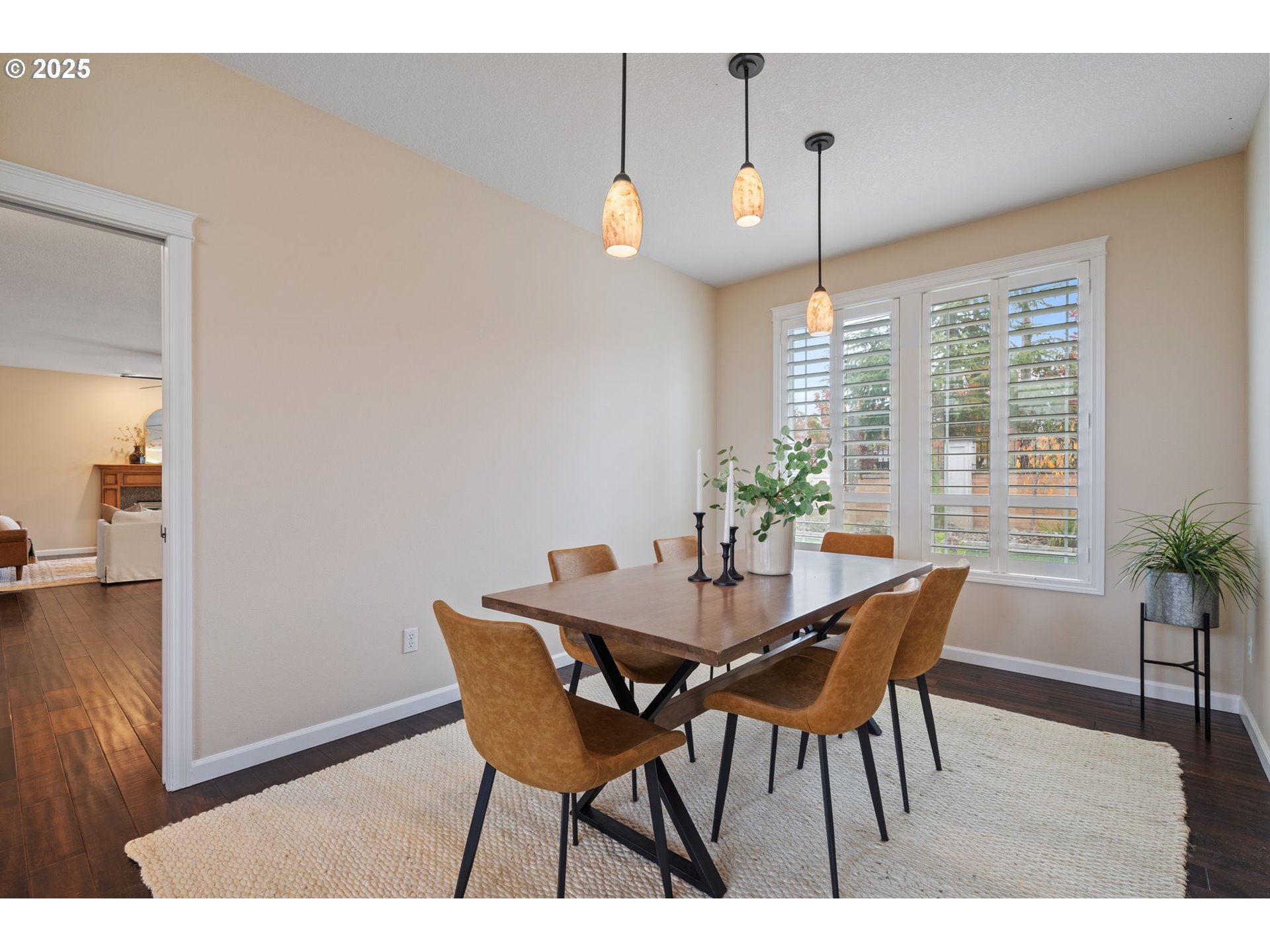 1516 South Dusky Drive Ridgefield, WA 98642 - Photo 10 of 43 a view of a dining room with furniture and wooden floor