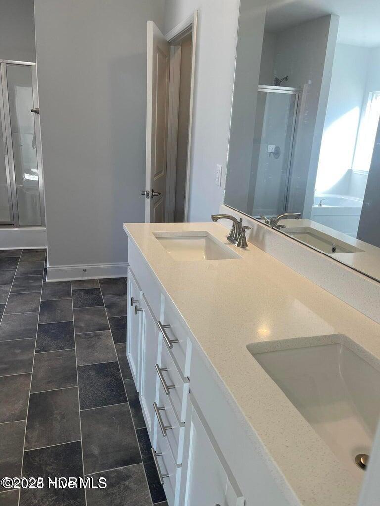 154 Poker House Road Grimesland, NC 27837 - Photo 18 of 23 Photos are of the same floor plan in a different community and are for layout and demo purposes only. Upgrades, colors and finishes may differ. Home is currently under construction.