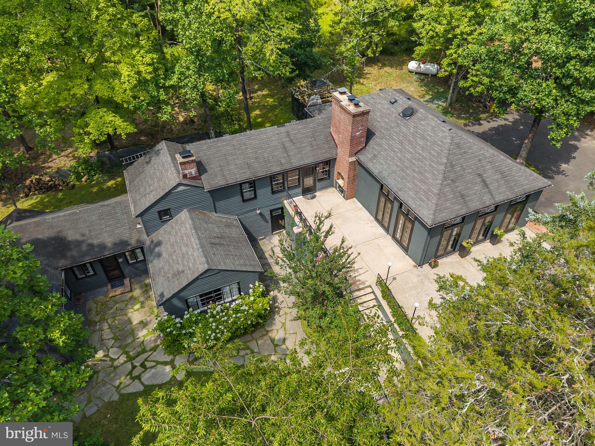 592 Province Line Road Hopewell, NJ 08525 - Photo 6 of 70 an aerial view of a house with a yard and large tree