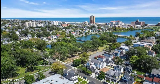 a view of a city with a lake