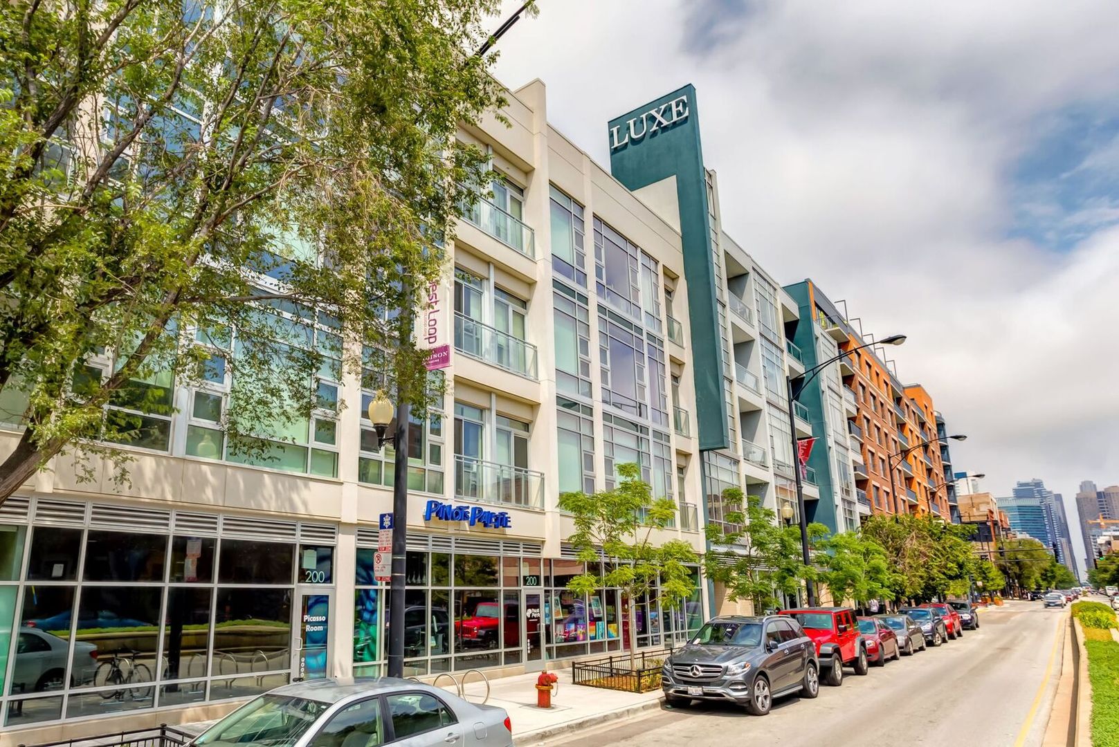 1222 West Madison Street, Unit 227 Chicago, IL 60607 - Photo 1 of 19 a front view of a building with street view