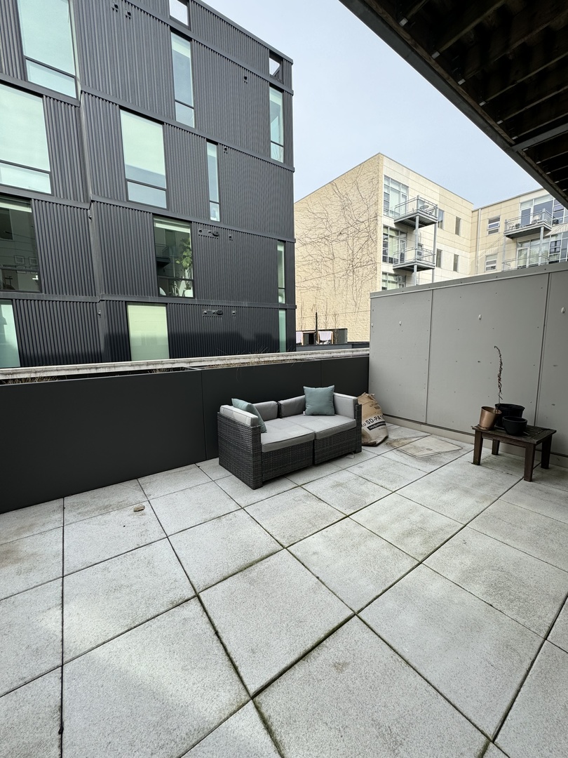 1222 West Madison Street, Unit 227 Chicago, IL 60607 - Photo 5 of 19 a view of roof deck with seating space