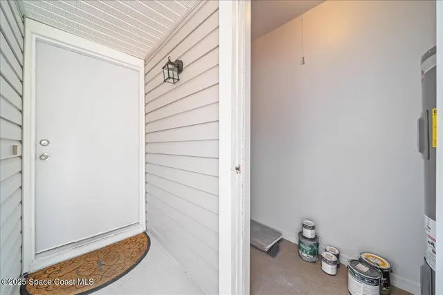 a view of a room with rack on the wall