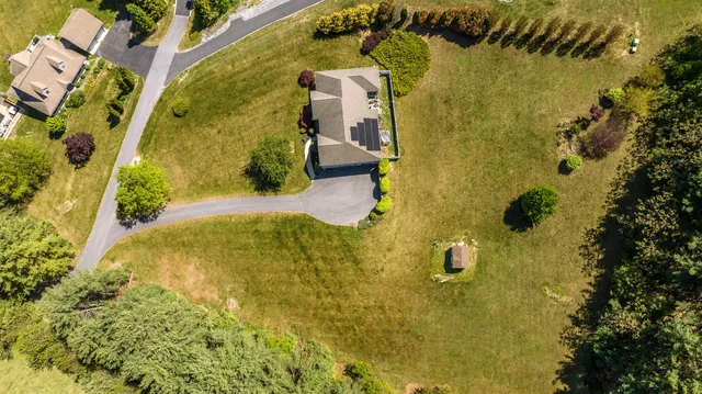a living room with furniture fireplace and a flat screen tv