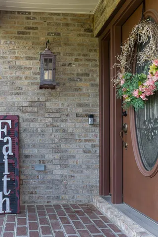 a bathroom with a shower and a sink