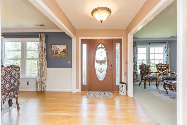 a kitchen with stainless steel appliances granite countertop a sink and cabinets