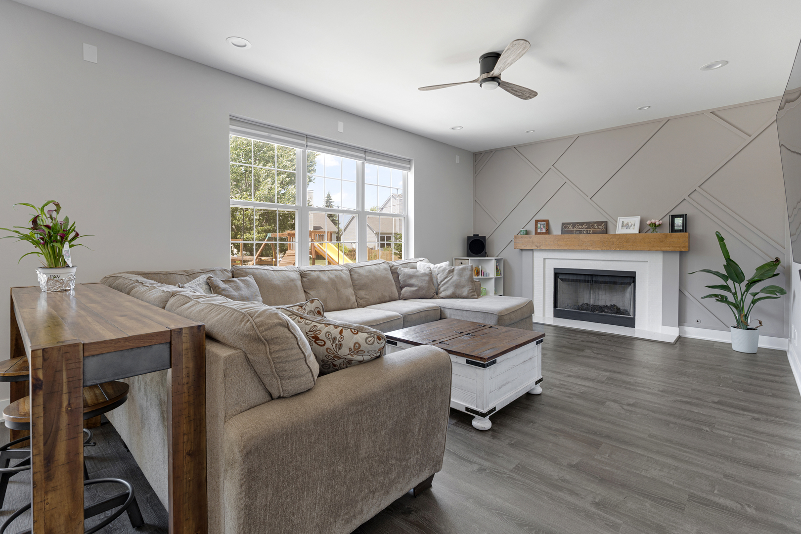 2751 Cedar Creek Cutoff Road Wauconda, IL 60084 - Photo 13 of 34 a living room with furniture and a fireplace